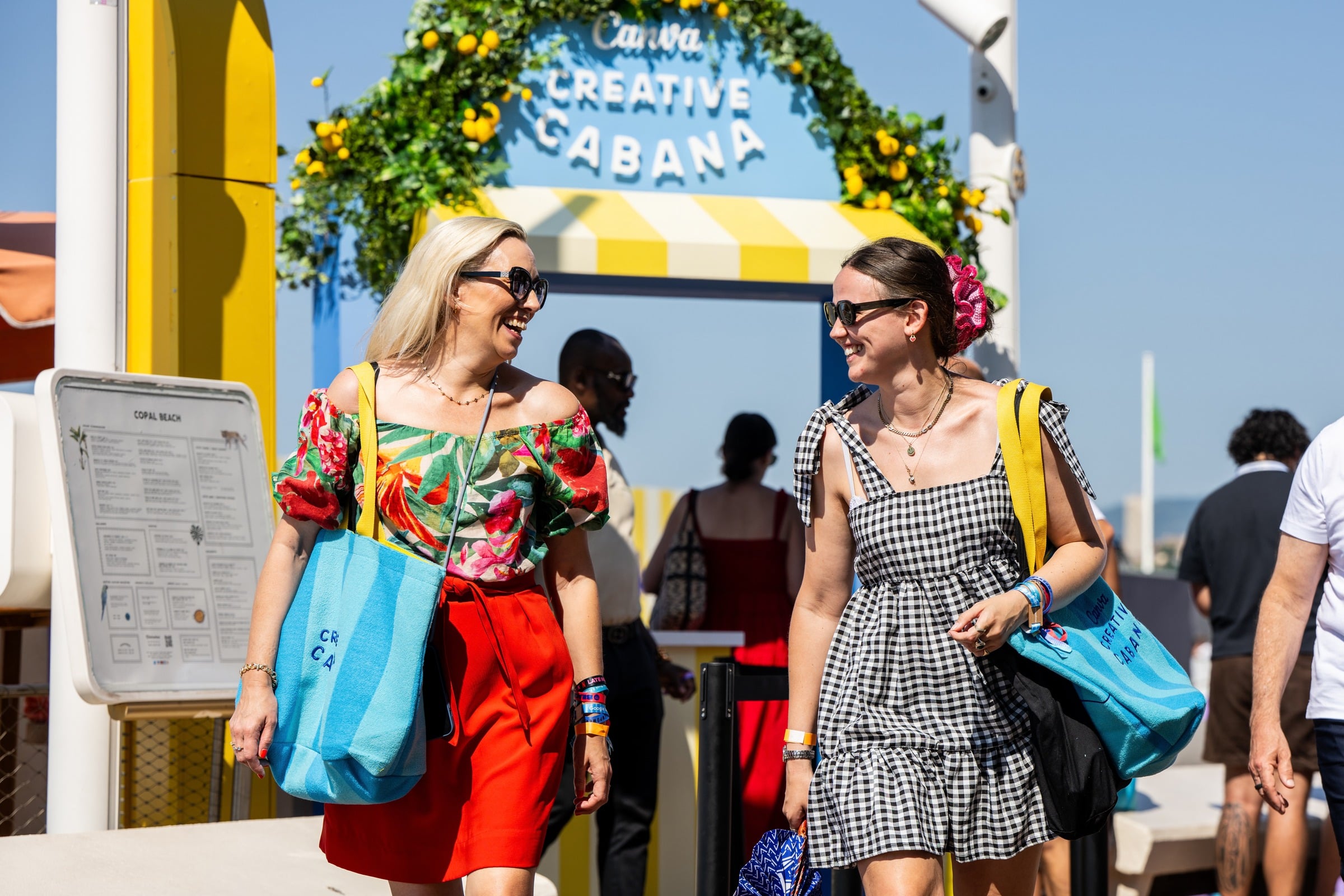Guests arriving under the Creative Cabana arch