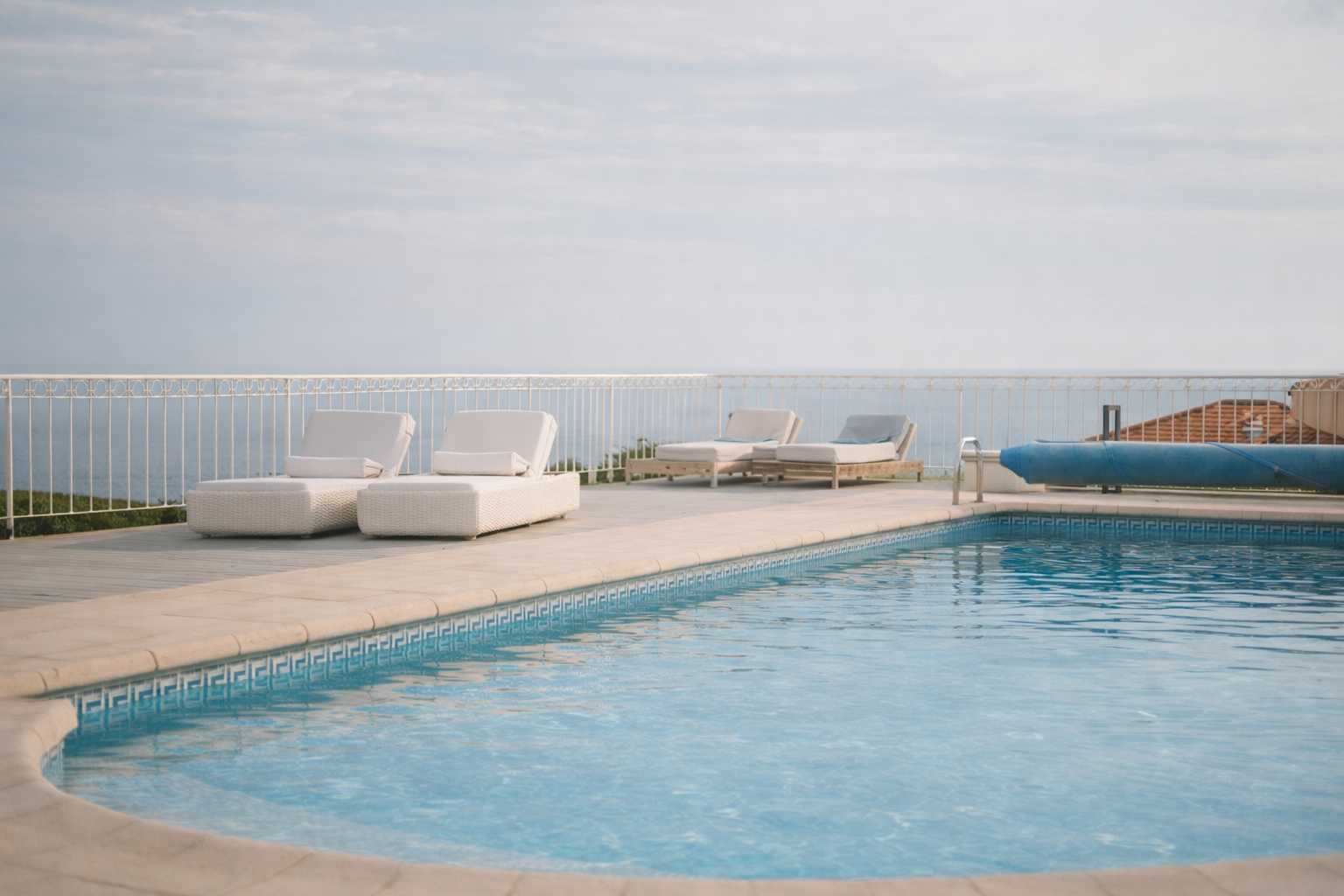 Whitewashed terrace overlooking the pool